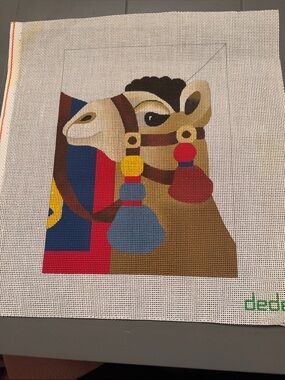 Dede Hand Painted Needlepoint Canvas features a colorful, camel design. 🐈‍⬛